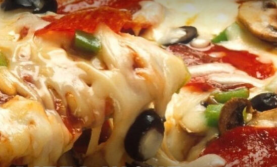 pizza-night Monday Dinner Deal - Buy one pizza, get one pizza 1/2 Price